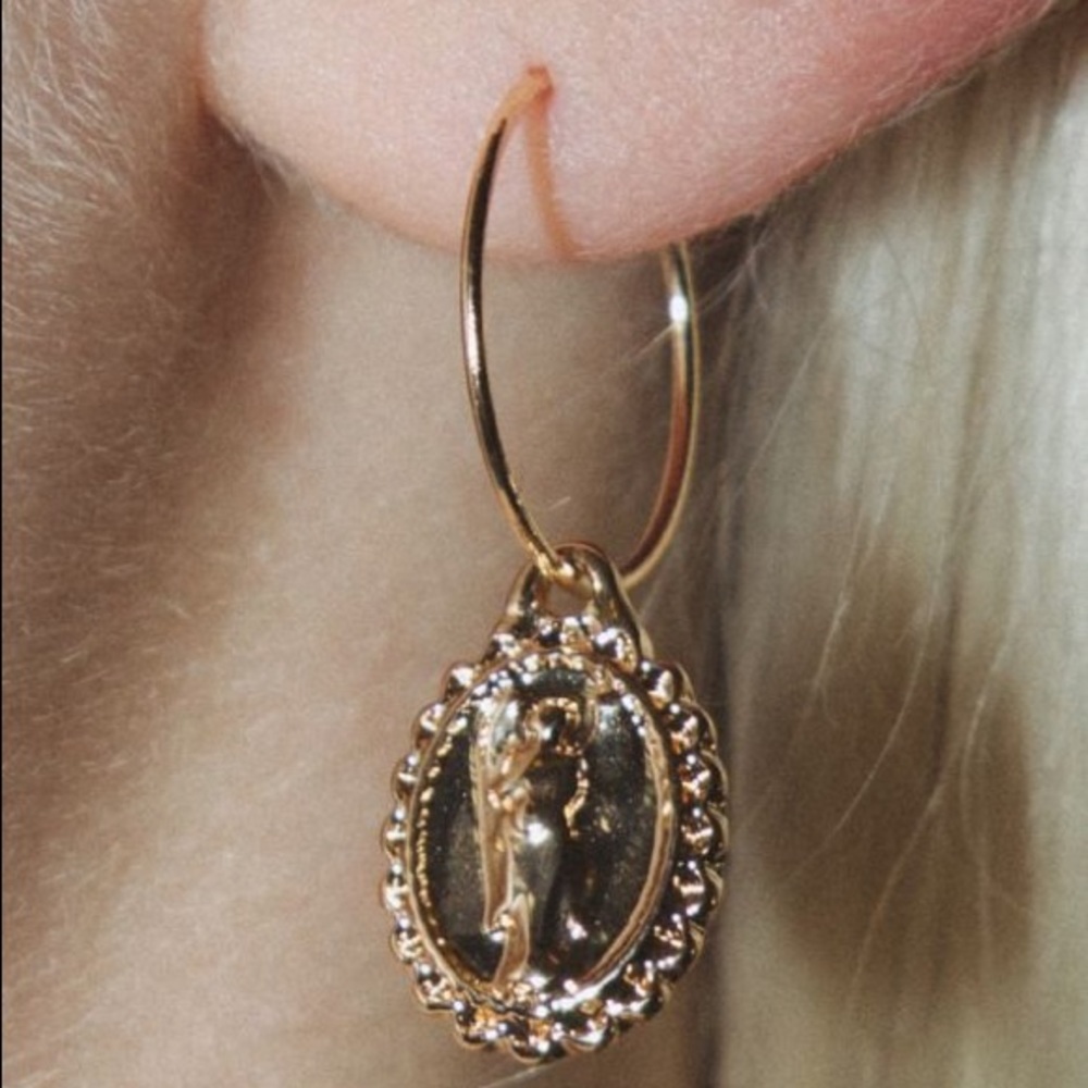 Brandy Melville gold angel coin earrings